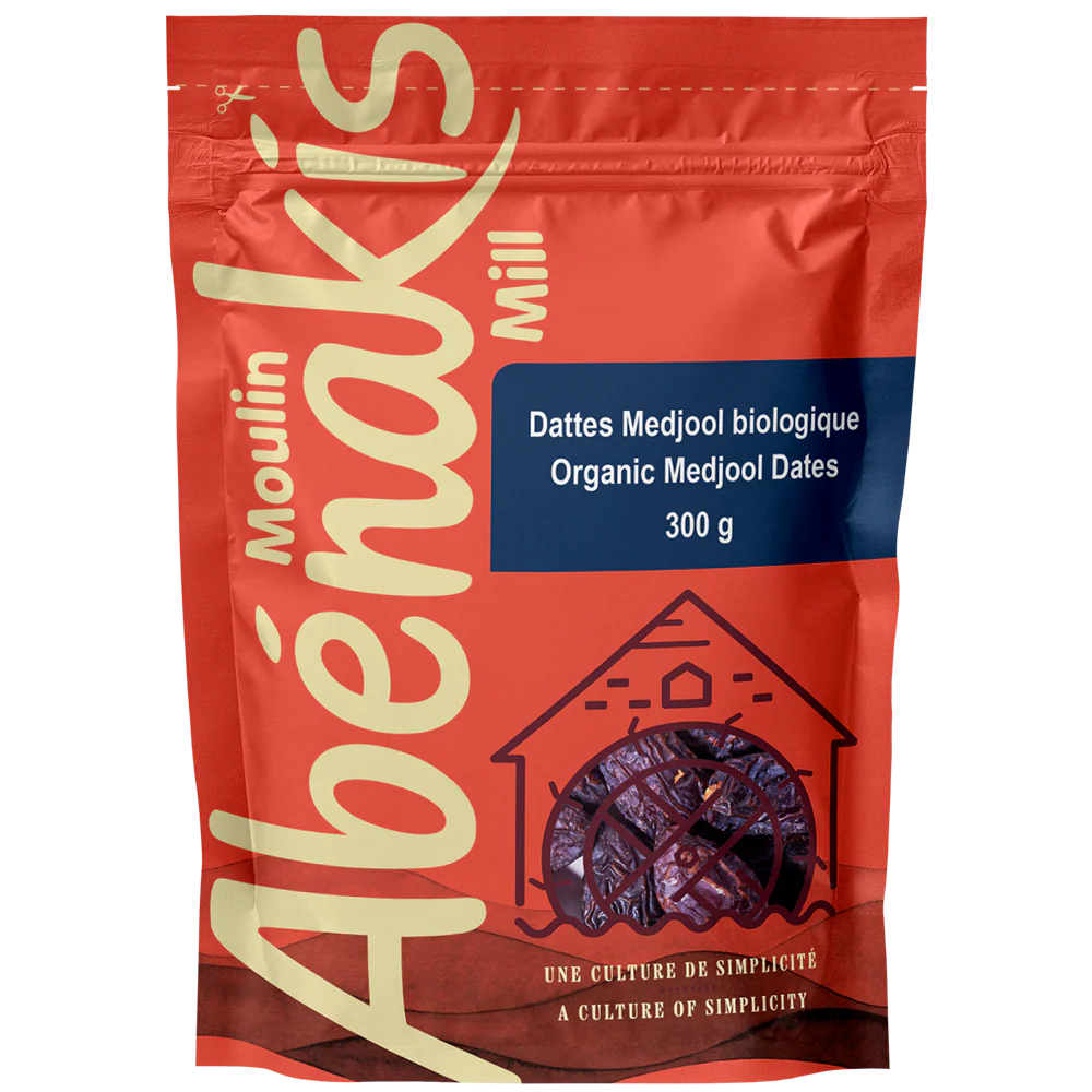 Red package of Moulin Abénakis organic Medjool dates on a white background