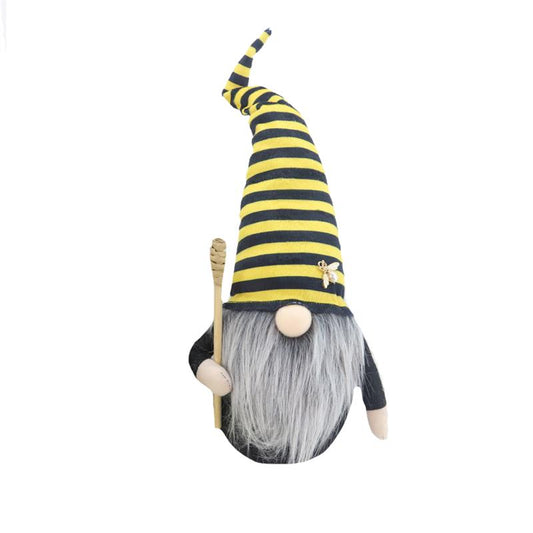 Gnome d'abeille avec bâton de miel