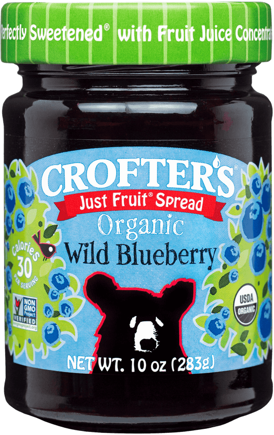 Jar of Crofter's Organic Wild Blueberry Just Fruit Spread with blue label and green lid