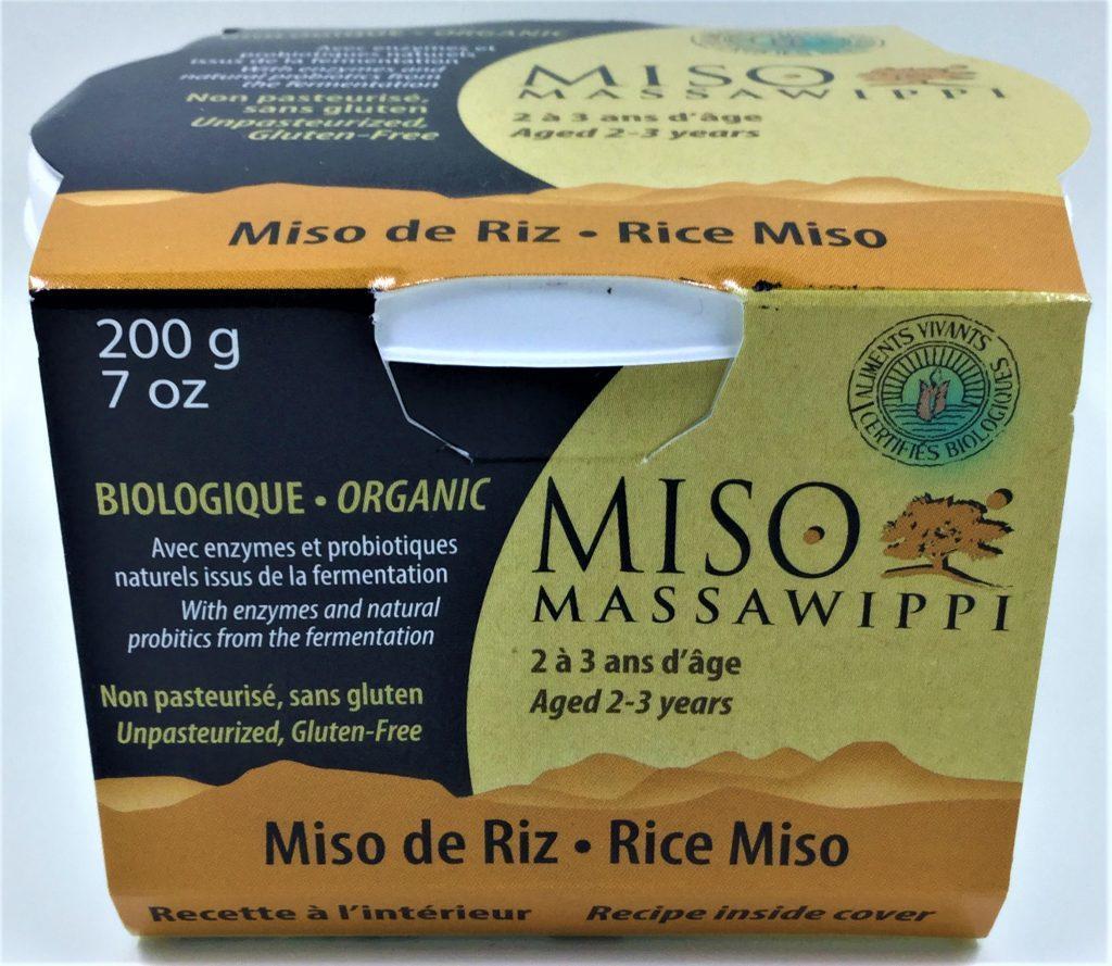 A jar of Aliments Massawippi rice miso (200g), labeled gluten-free, featuring a smooth fermented paste used for soups and seasoning