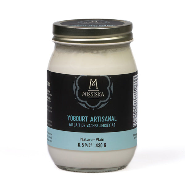A jar of Missiska maple yogurt, showcasing a creamy yogurt with natural maple flavor in labeled packaging.