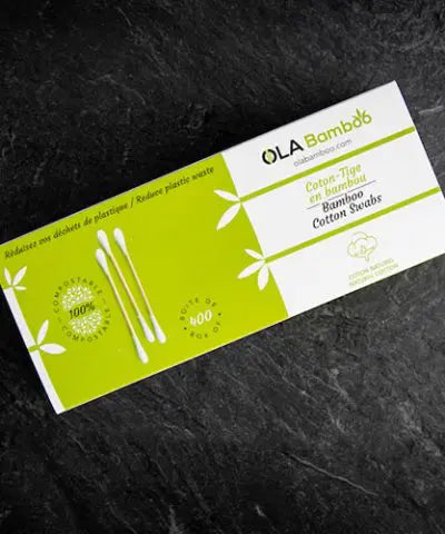 box of Ola Bamboo cotton swabs on slate grey background