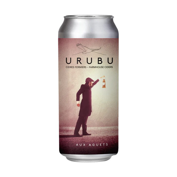 A bottle of Urubu unfiltered raw farmhouse cider, featuring a naturally cloudy apple cider.