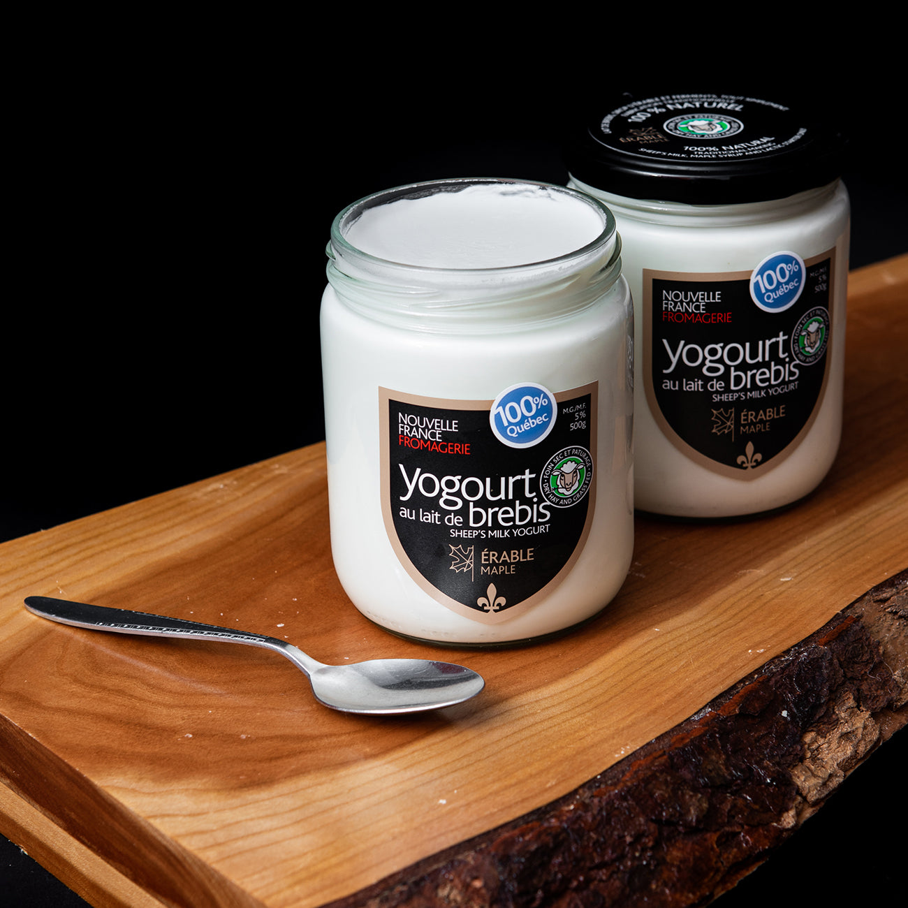 A glass jar of Nouvelle France sheep’s milk yogurt labeled Érable/Maple