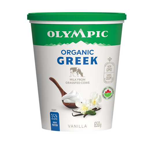 A container of Olympic organic Greek yogurt vanilla, showcasing a thick, creamy yogurt with a hint of vanilla flavor in branded packaging.