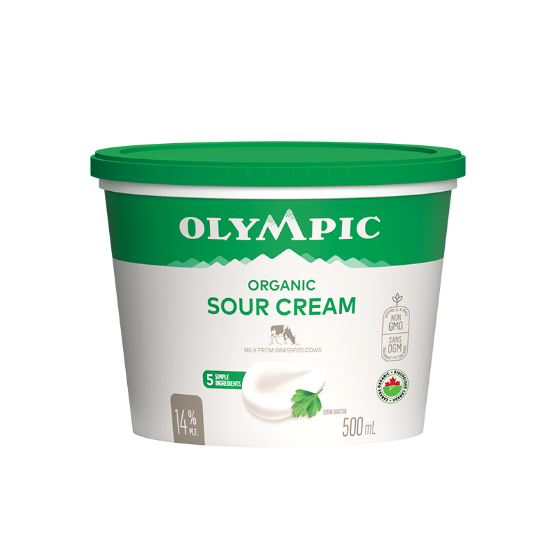 A container of Olympic Organic sour cream (500 ml), featuring a smooth, creamy texture in a resealable tub with organic labeling