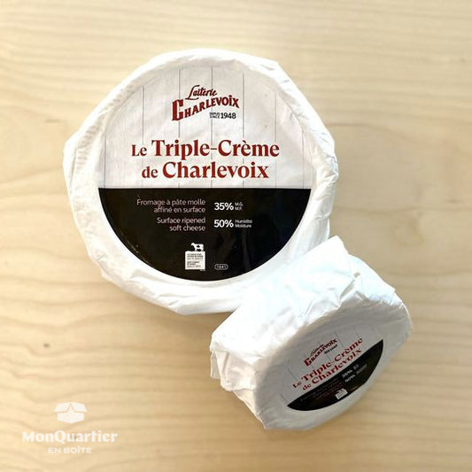 Roll of Triple-Crème cheese by Laiterie Charlevoix with white packaging