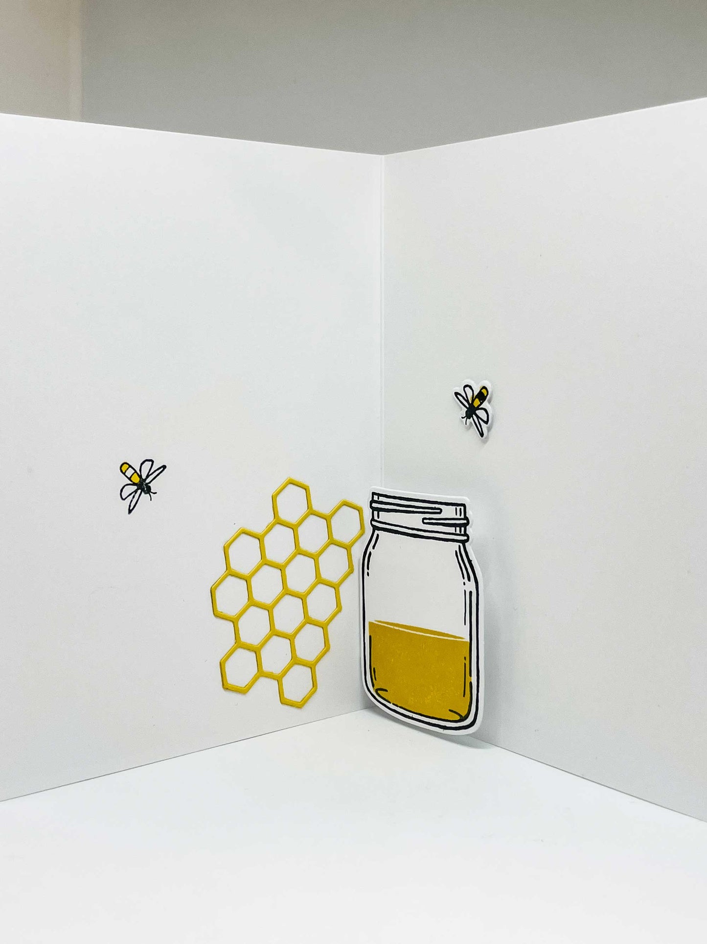 Pop-up greeting card with honey jar, honeycomb and honeybees