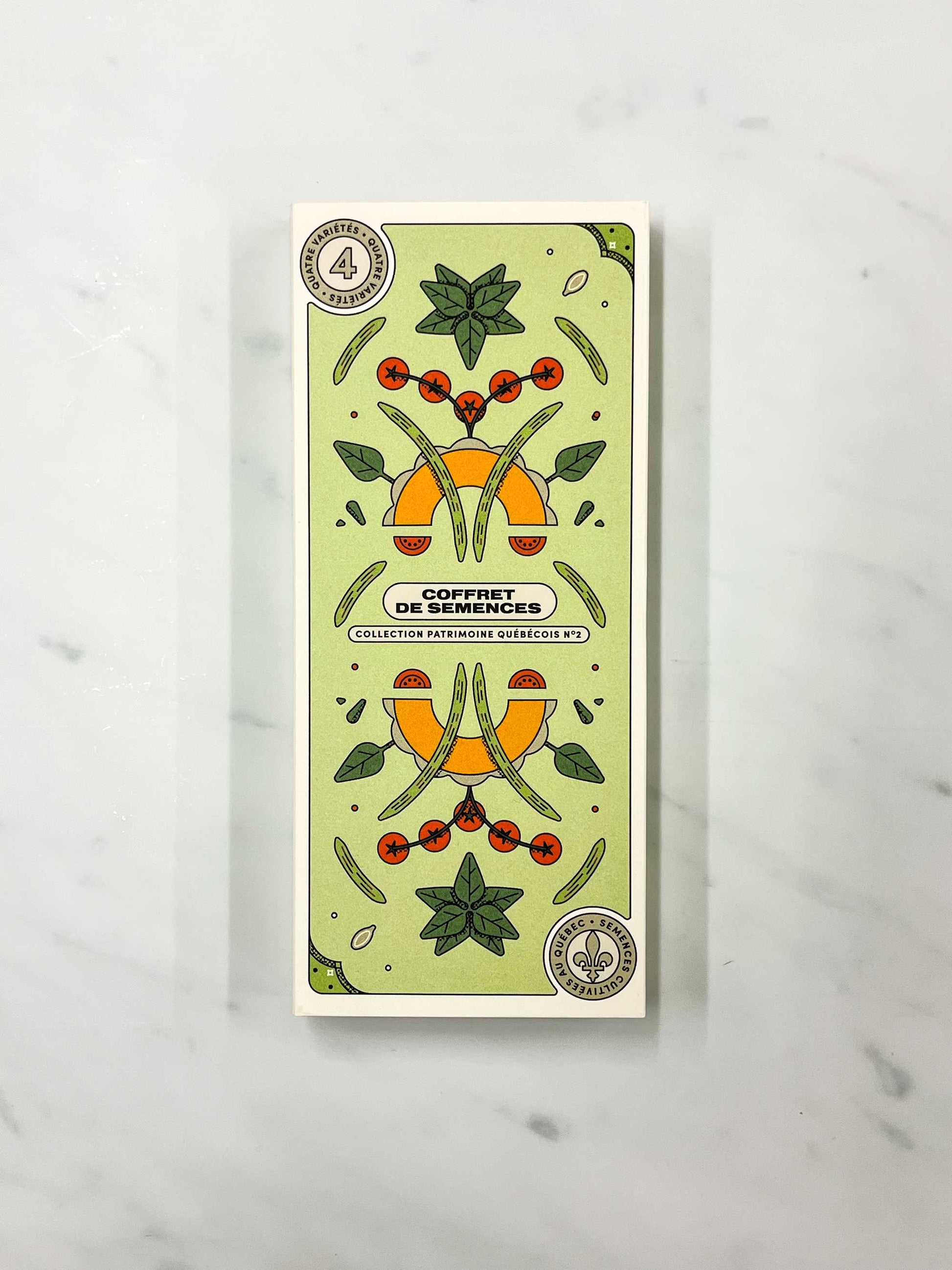 Quebec Heritage seed collection box set with illustrations of tomatoes, spinach, green beans, melon wedges