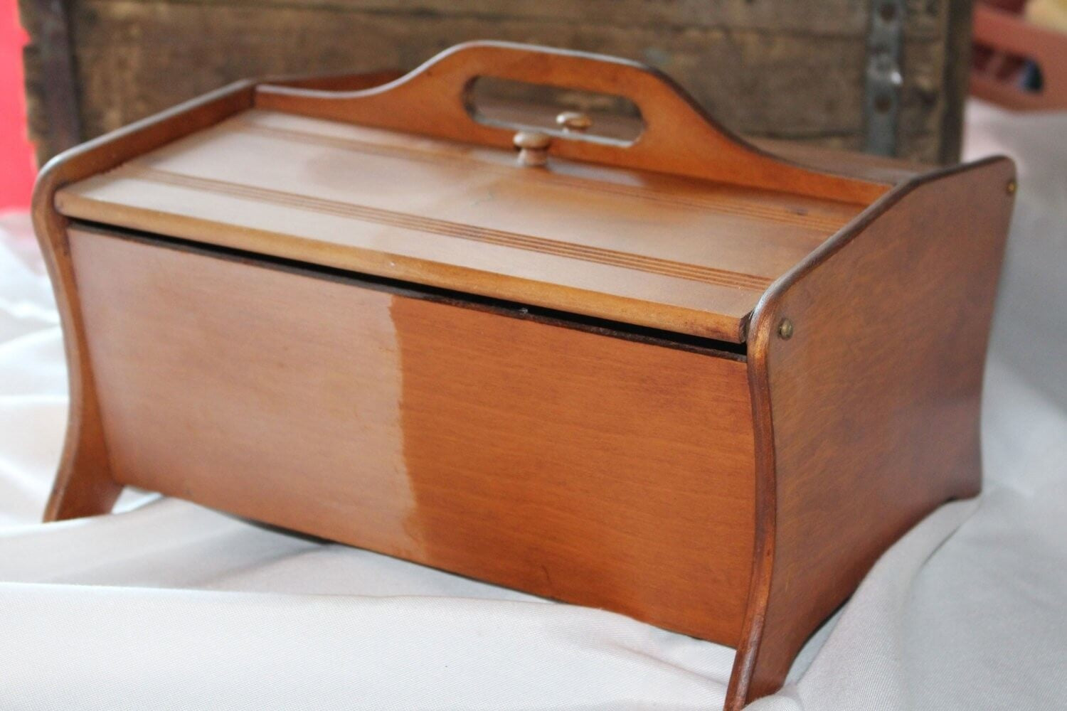 Small wood chest looking polished after using B Factory handmade beeswax wood butter