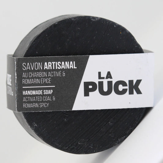 Round, handmade artisanal soap made with activated charcoal