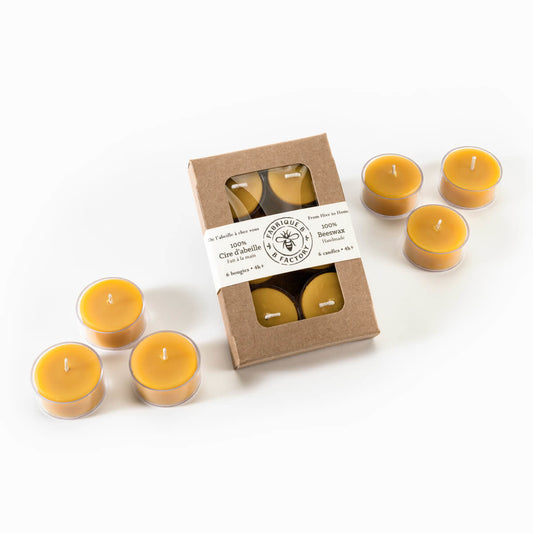 6 beeswax tea light candles surrounding set of 6 beeswax tea light candles in gift box with B Factory logo on lid