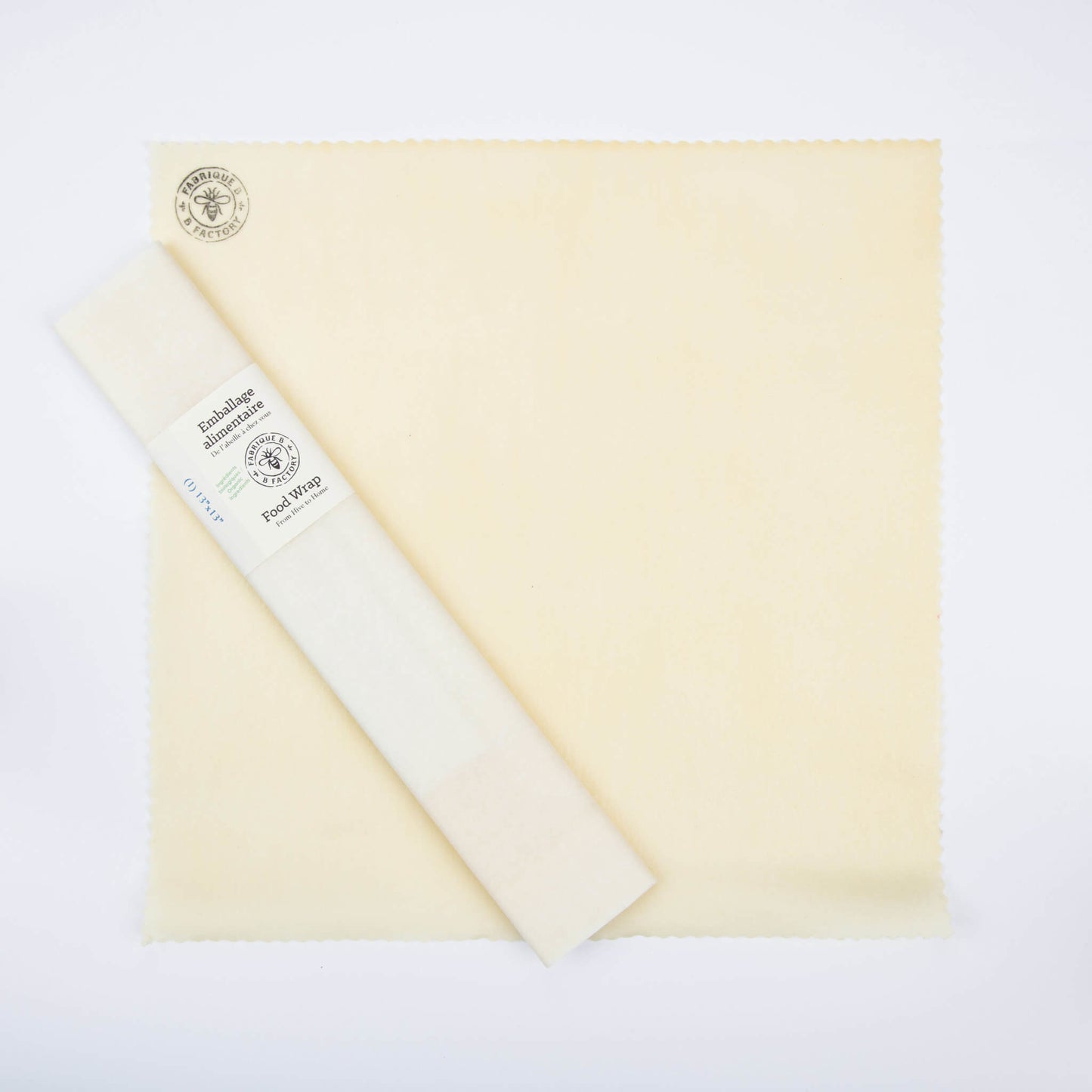 Organic beeswax food wrap with B Factory logo in top-left corner