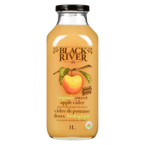 A bottle of Black River pure juice Apple Cider, showcasing a crisp apple juice in a clear, labeled bottle.