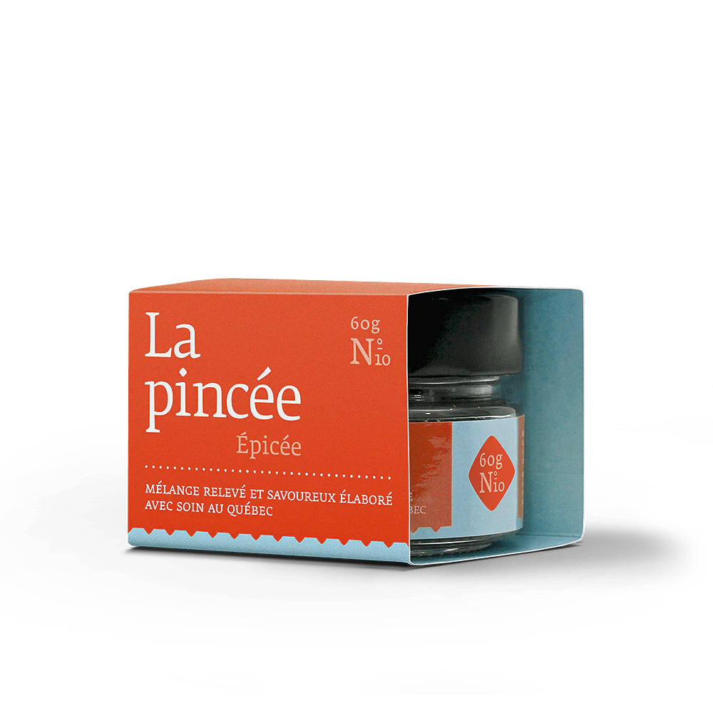 Packaging of 'La pincée Épicée' with a jar inside on a white background
