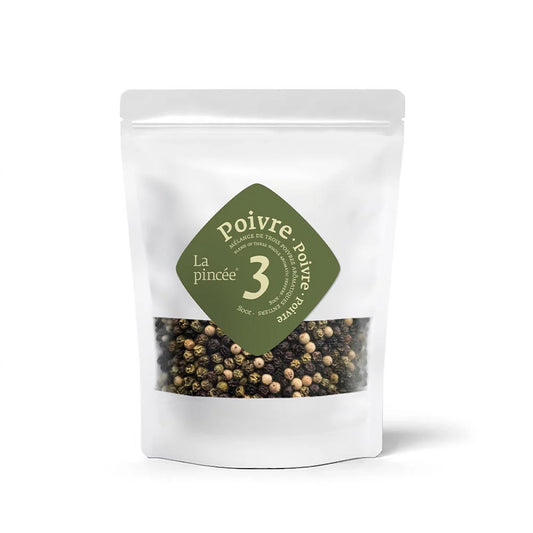 Packaged peppercorns with a green label on a white background