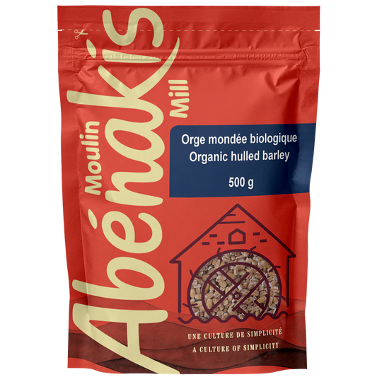 A bag of ABÉNAKIS organic hulled barley (500g), featuring whole grain barley in natural, resealable packaging.