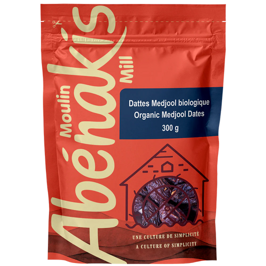 Red package of Moulin Abénakis organic Medjool dates on a white background