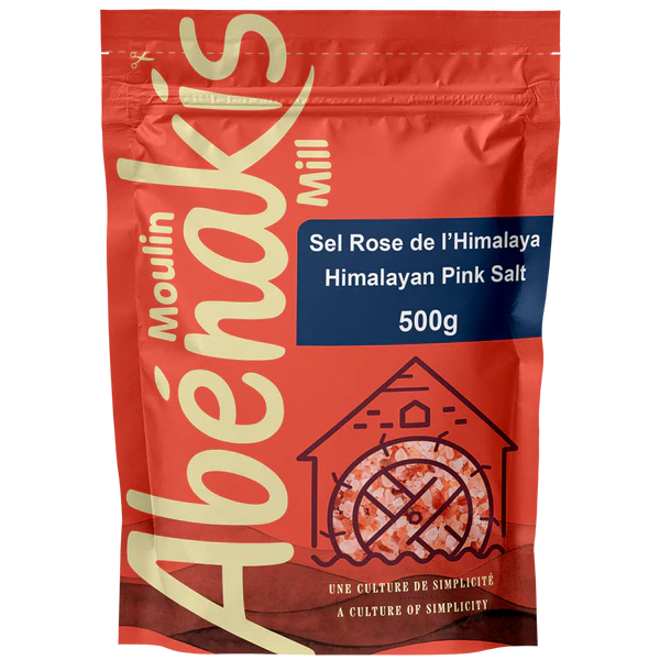A package of ABÉNAKIS Pink Himalayan sea salt (500g), featuring coarse pink salt crystals in a resealable bag.