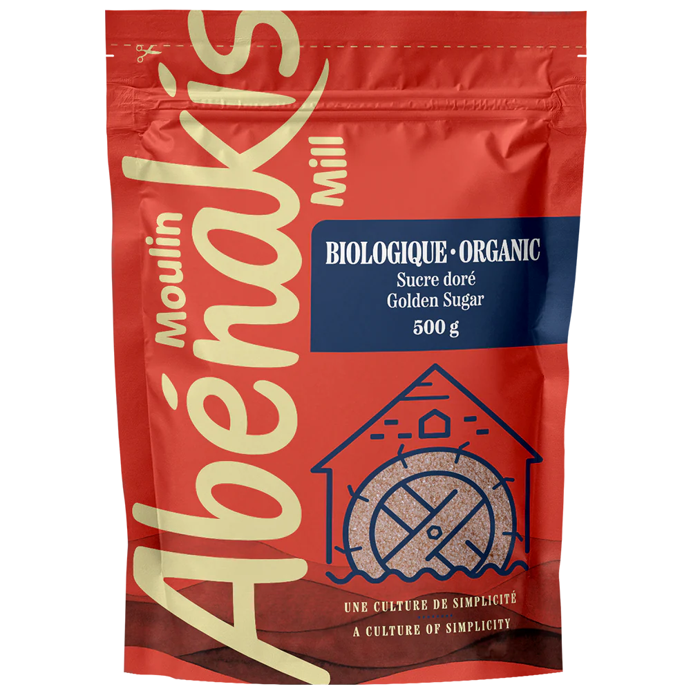 Red package of Moulin Abénakis organic golden sugar on a white background