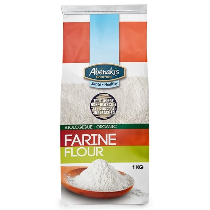 A bag of ABÉNAKIS organic all-purpose unbleached white flour, featuring finely milled flour in natural, resealable packaging. (1KG)