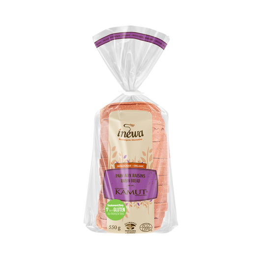 A loaf of IneWa organic Kamut raisin bread, showcasing a soft, low-gluten bread with visible raisins in branded packaging.