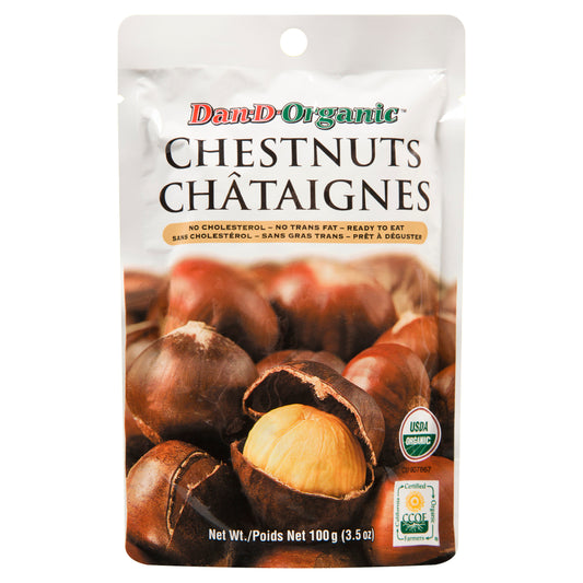 A pouch of Dan-D-Organic chestnuts (100g) labeled “ready to eat,” featuring whole and peeled chestnuts on the packaging with USDA Organic certification.
