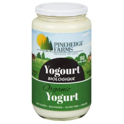 A jar of Pinehedge Farms organic plain yogurt, featuring a smooth, creamy texture made from organic milk