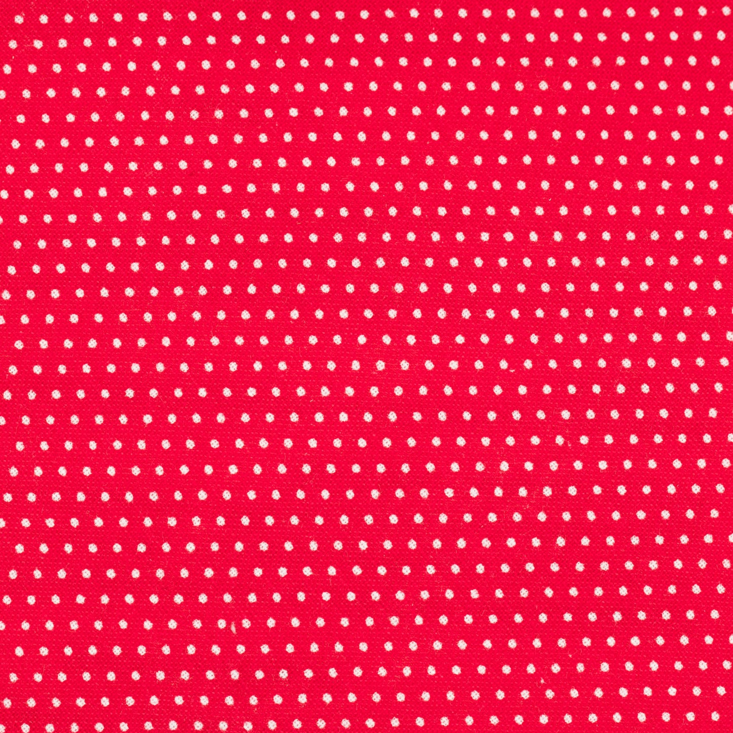 red fabric with tiny white dots