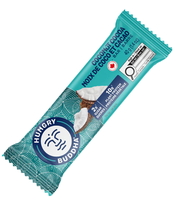 Hungry Buddha Coconut Cocoa protein bar in blue packaging on a clear background