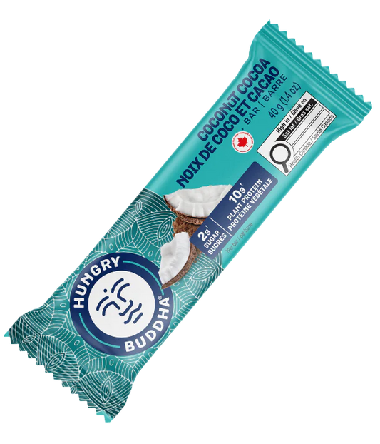 Hungry Buddha Coconut Cocoa protein bar in blue packaging on a clear background