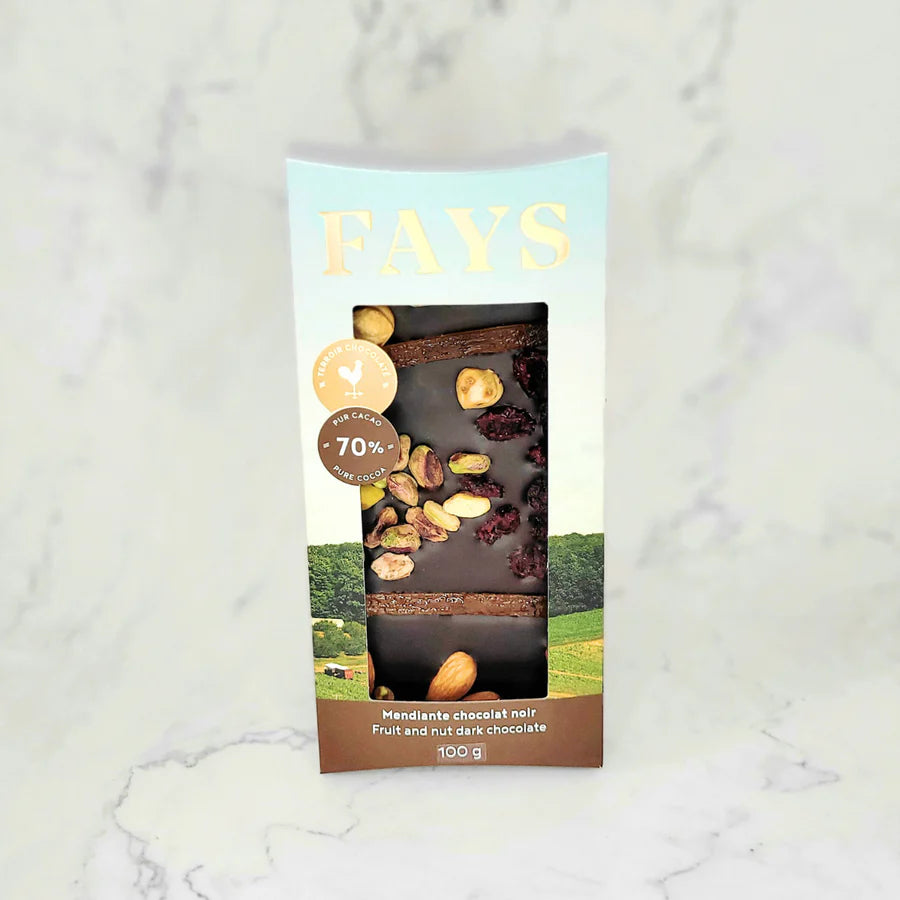 Fays chocolate bar packaging with fruit and nut dark chocolate on a marble background