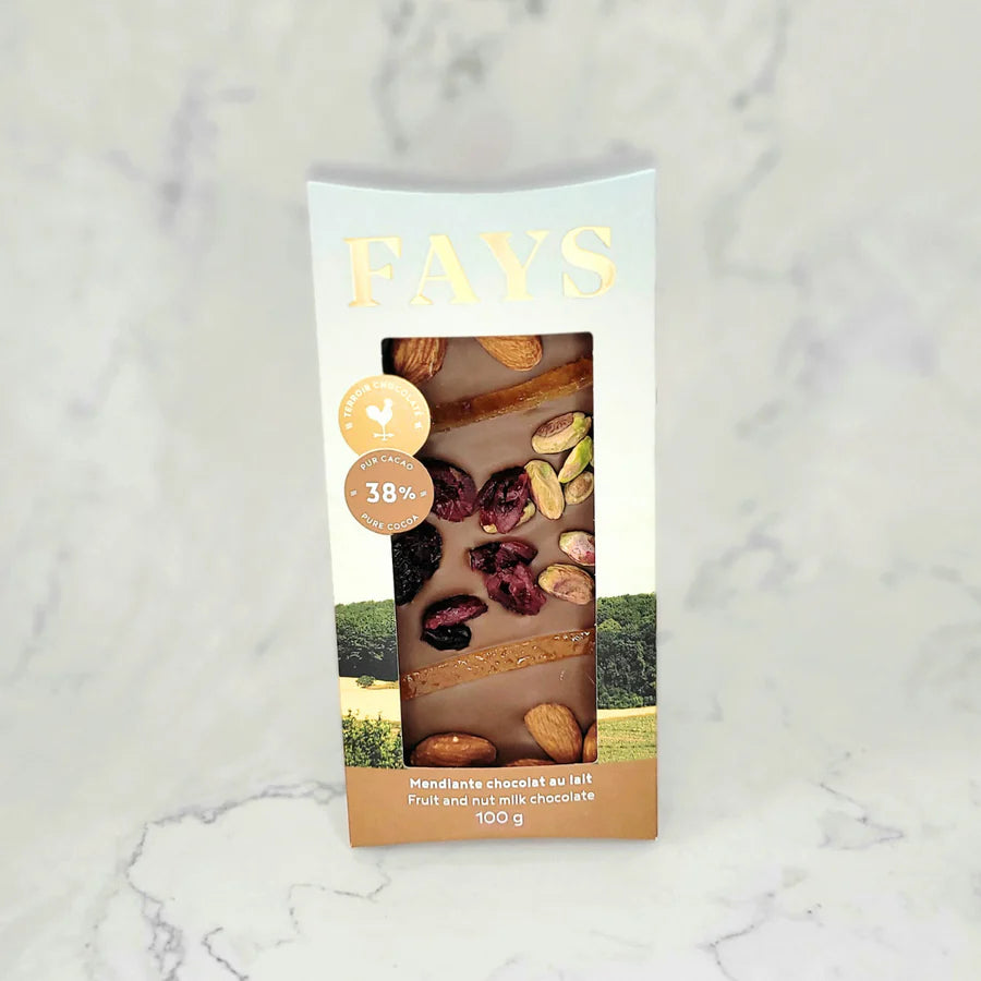 Fays milk chocolate bar packaging with fruit and nut ingredients on a marble background