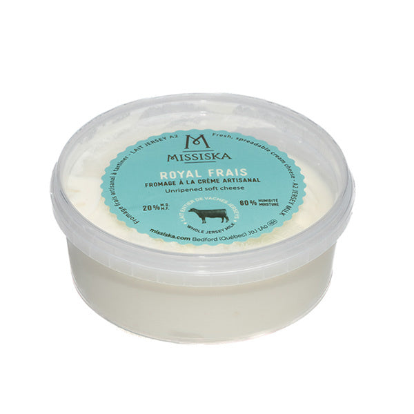 A round plastic container of Missiska Royal Frais fresh cream cheese, labeled as an unripened soft cheese made from Jersey milk