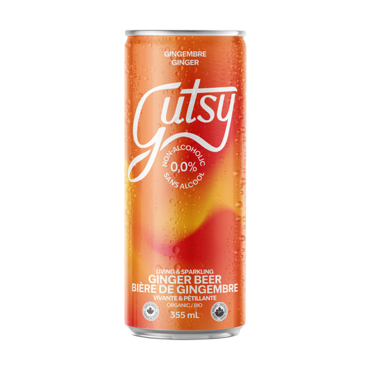 A can of GUTSY ginger beer, featuring a fizzy beverage with a bold ginger flavor