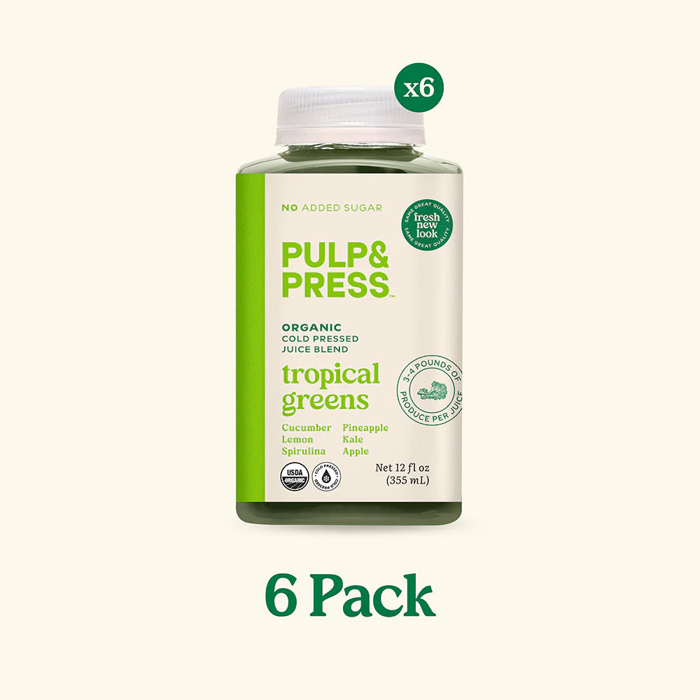 A bottle of Pulp & Press Juice Co. tropical green juice, a fresh-pressed blend of greens with tropical fruit notes.