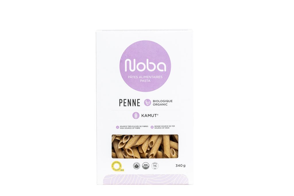 White and purple box of organic Kamut penne pasta by Noba 