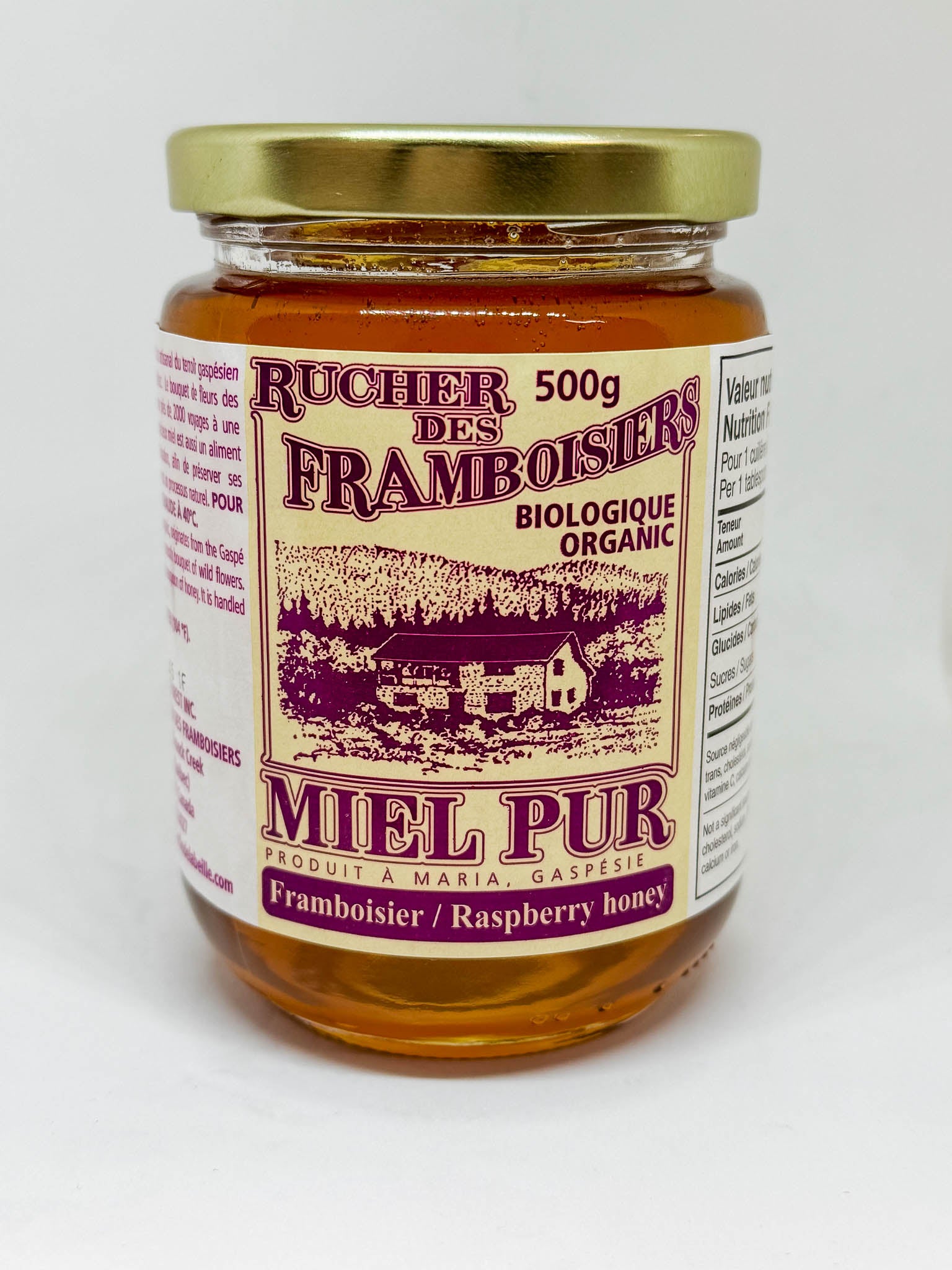 500g jar of organic Raspberry blossom honey by Rucher des Framboisiers on a white background