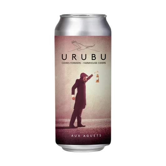 A bottle of Urubu unfiltered raw farmhouse cider, featuring a naturally cloudy apple cider.