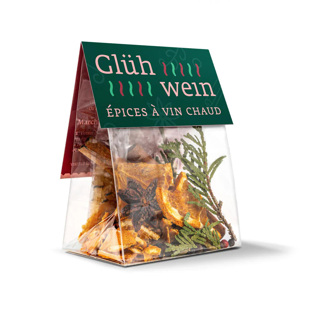Package of "Glüh wein" (mulled wine) spices with a green label on a white background