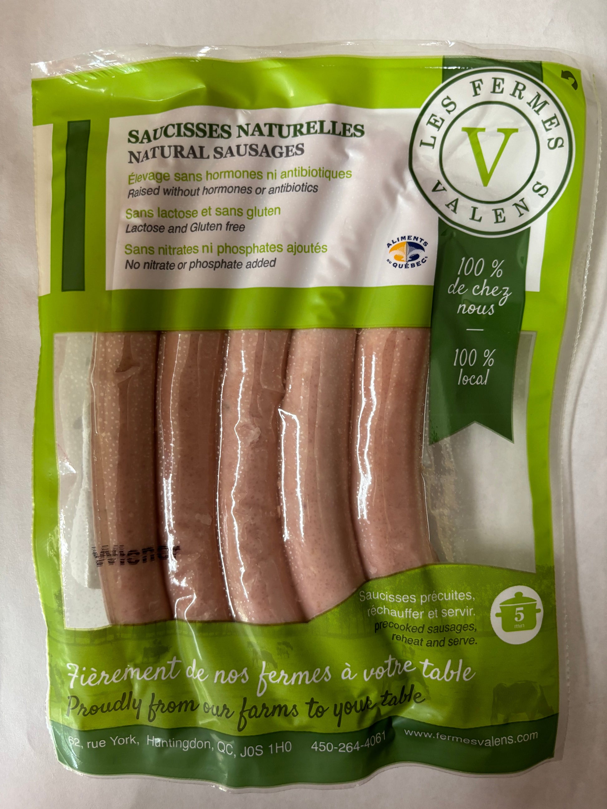 A package of Les Fermes Valens gluten-free natural wiener sausages, showcasing traditional sausages ready for cooking.