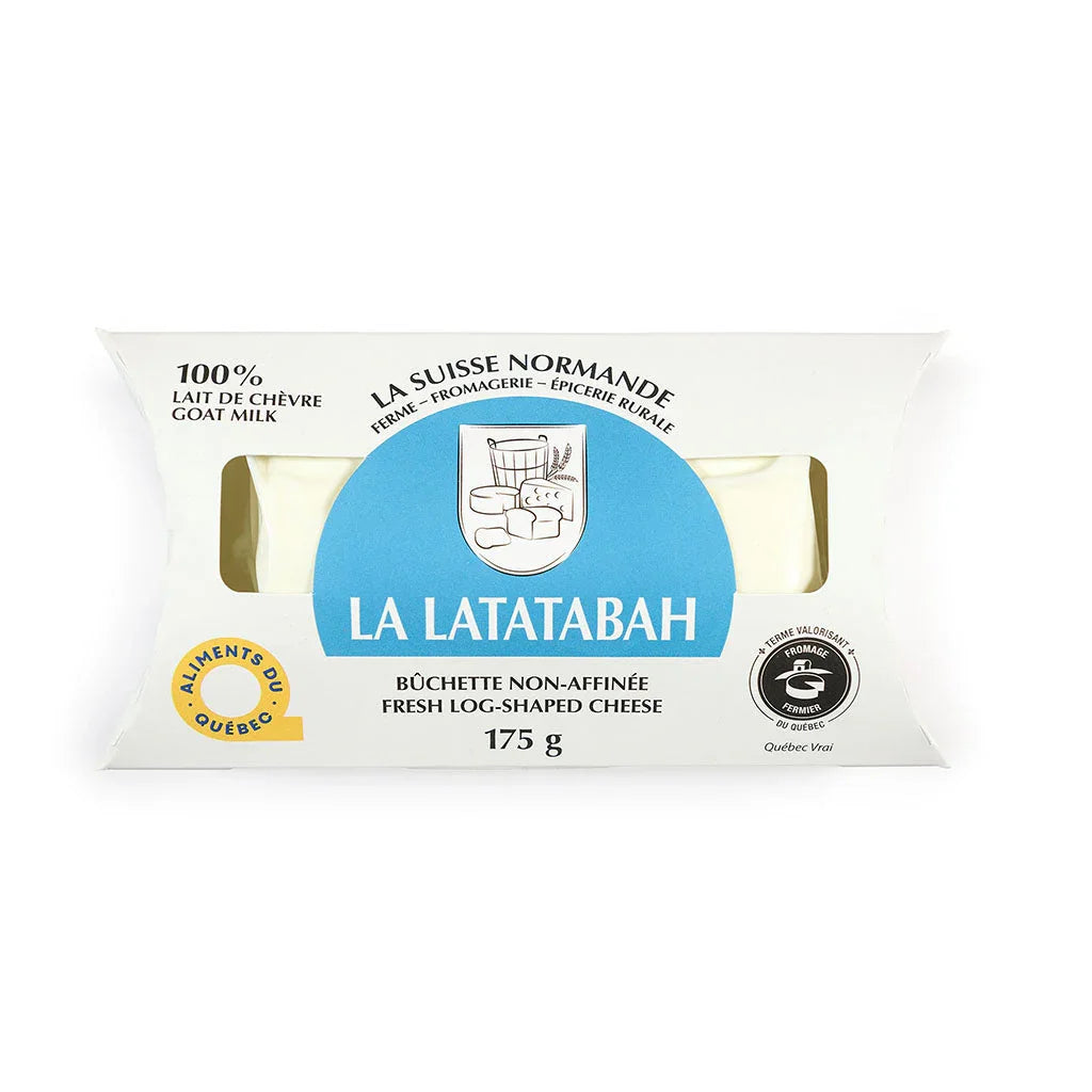 A round of Fromagerie La Suisse Normande Latatabah cheese, featuring a soft, creamy interior with a delicate rind in branded packaging.