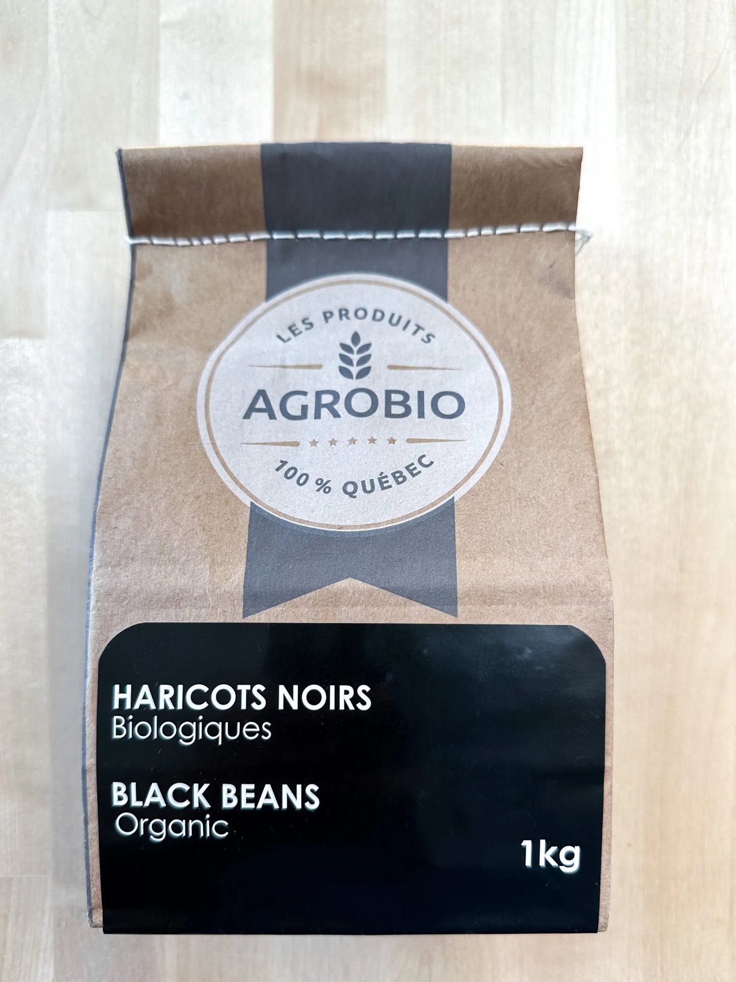 A package of Agrobio organic black beans, featuring whole dried black beans in natural, resealable packaging.