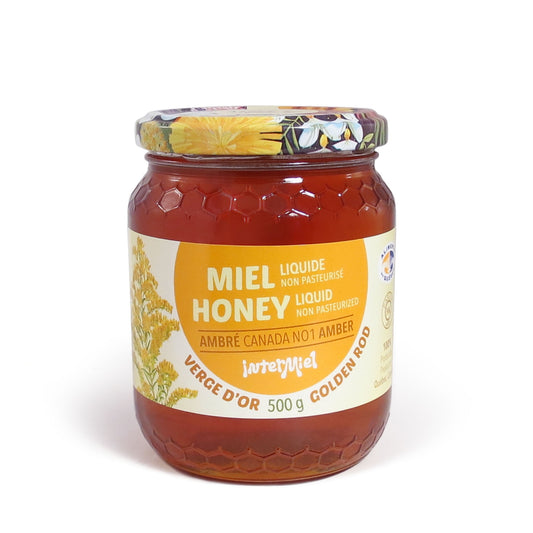 A 500g jar of Goldenrod Honey by Intermiel on a white background