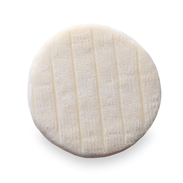 A round of Fromagerie La Suisse Normande Le Pizy cheese, featuring a soft, creamy interior with a delicate rind in