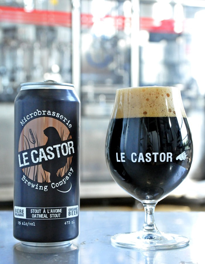 A can & glass of Microbrasserie Le Castor oatmeal stout beer, featuring a dark, rich appearance with smooth roasted malt notes.