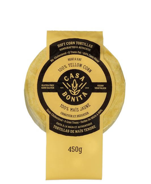 Yellow package of Casa Bonita 100% yellow corn tortillas with black label on a white background