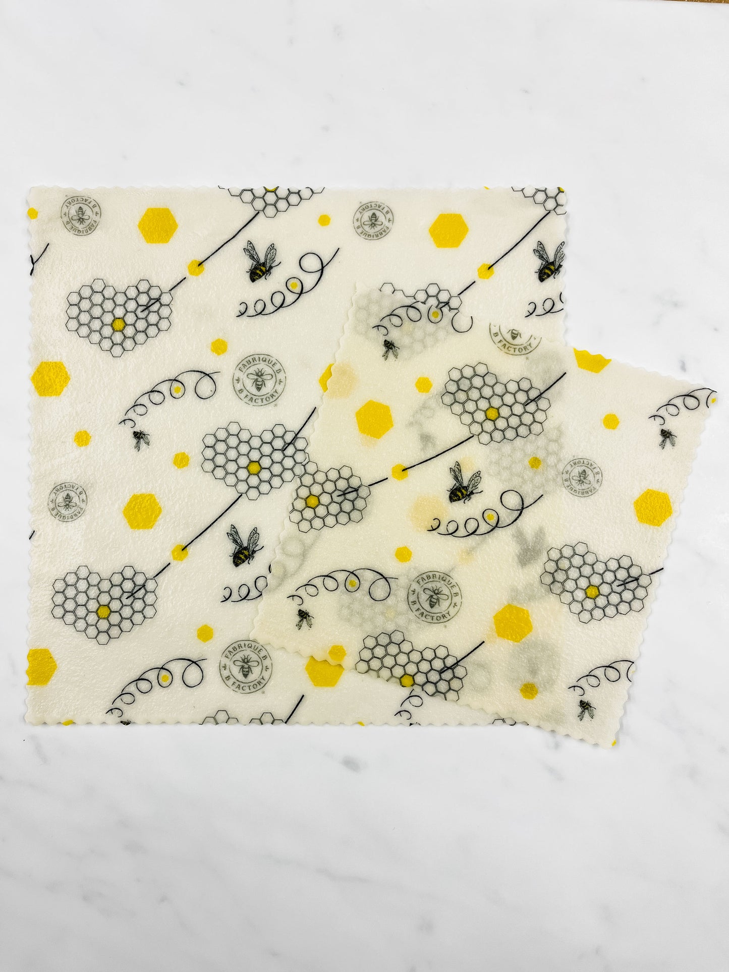 Pack of 2 square beeswax food wraps with honeycomb pattern, 1 medium beeswax wrap, 1 small beeswax wrap