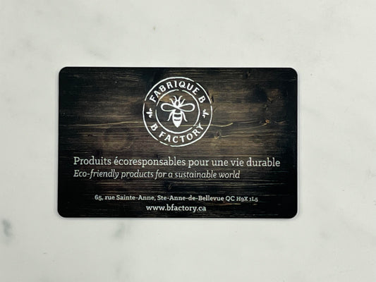 B Factory gift card that says in white text, eco-friendly products for a more sustainable world
