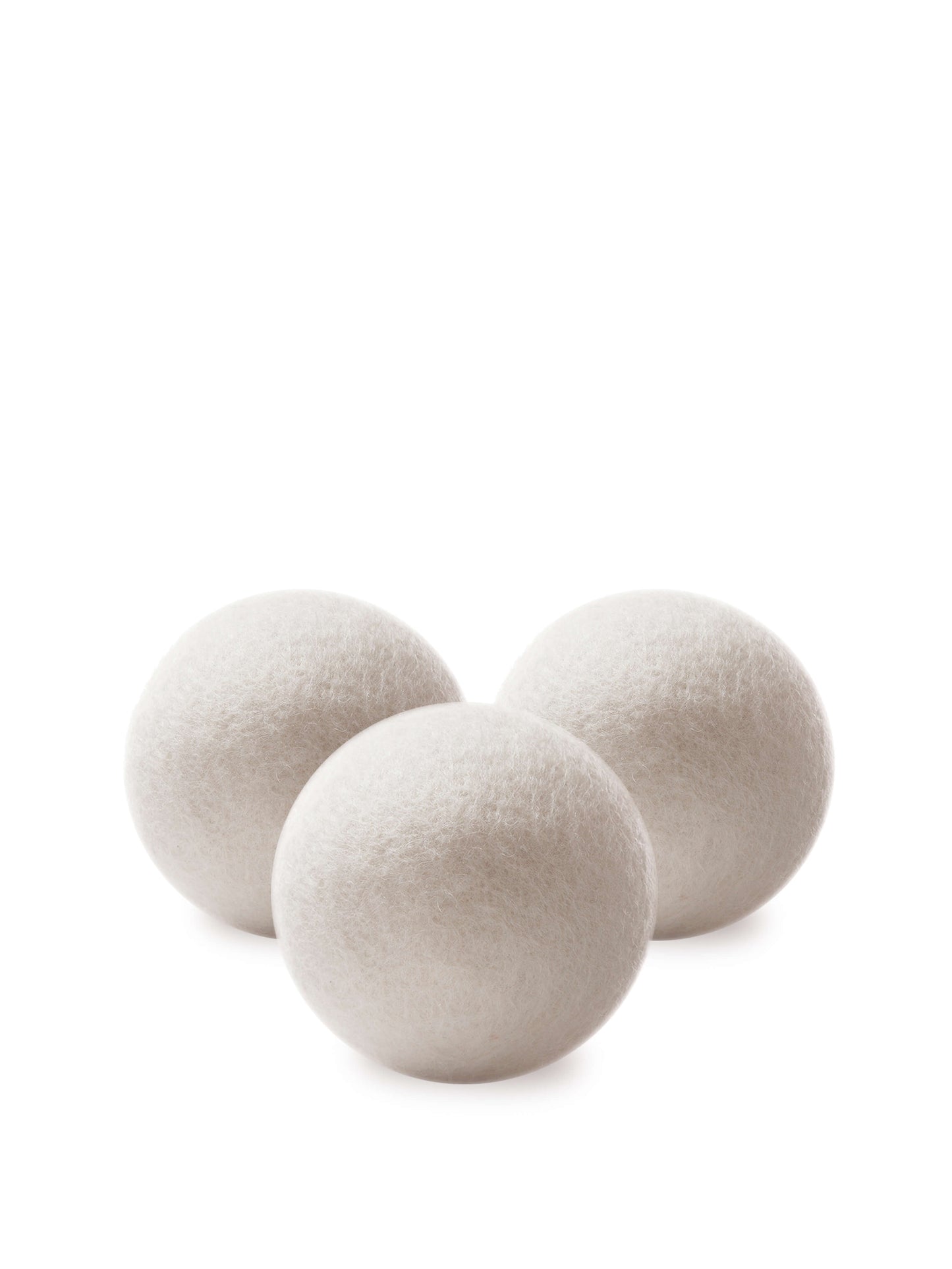 3 white wool dryer balls